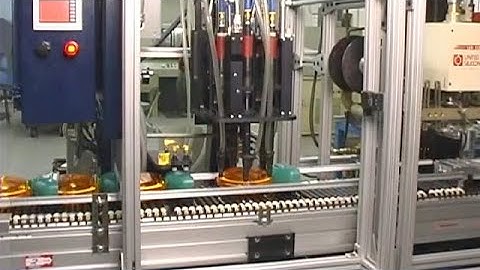 Multi-Spindle Conveyor Fed Screw Driving Station from Visumatic