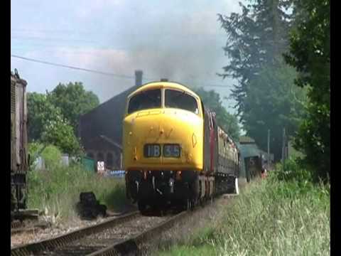 The West Somerset Railway's Mixed Traction Gala once again recalled the classic modern traction of Diesel Hydraulics that reigned the Western Region of BR from the late 1950's to the late 1970's. The gala was dominated with a feast of Maybach music, it also marked the return of Class 52 Western D1010 Western Campaigner after a 3 year absence. The weather for the first two days of the gala was to be scorching hot but none the less beautifull. In this film is a full round up of all the Diesel Hydraulics filmed during Friday 11th to Saturday 12th June. From the Westerns, Warships to the Hymek and Class 14s. The Hymek was repainted into BR two-tone green as part of GWR 175. However the Hymek failed during the first day of the gala but was repaired for the next day. Locos included in the film: Class 52 Western D1010 'Western Campaigner' Class 52 Western D1062 'Westen Courier'' Class 42 Warship D832 'Onslaught' Class 42 Warship D821 'Greyhound' (temporarily renamed 'Chris Broadhurst 1956 - 2008') Class 35 Hymek D7017 Class 14s D9520 & D9526 Please note: all lineside shots were taken by permission of the WSR as I own a linesiders pass.