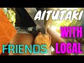 Aitutaki Cook Islands interacting with locals Polynesians with coconuts street walking vieW