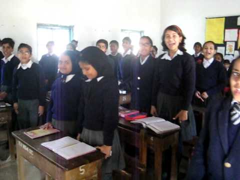 Reynolds- Teacher welcome from students when walking into class in India