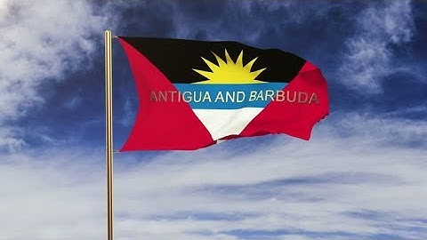 4K Antigua And Barbuda flag with title waving in the wind. Looping sun rises style. Animation loop