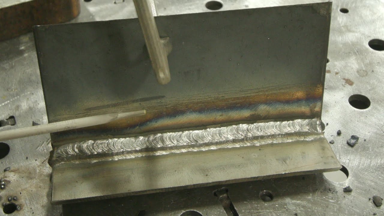 Welding Stainless to Carbon Steel with 309 (1F) - YouTube
