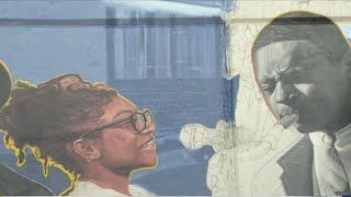 Mural honors Rochester's Clarissa Street Village