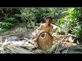 Making fish traps in the ancient way. Survival in the rainforest