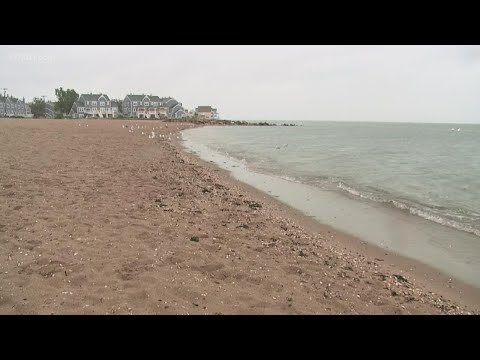 East Haven residents visit Cosey Beach where its rainy but overall calm