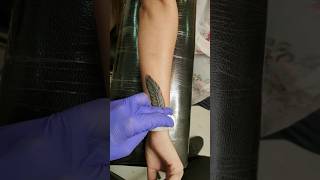 Woman Feather Tattoo Design .....