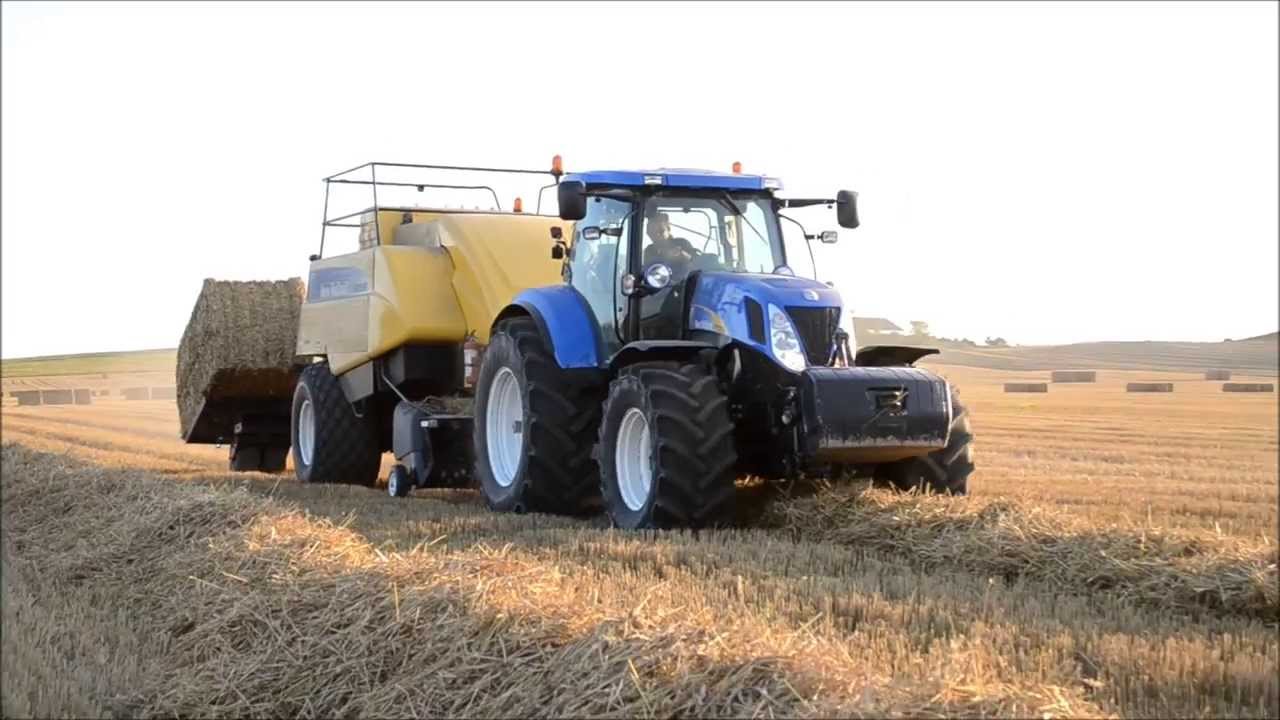 New Holland T7070 with New Holland BB9090 baler behind