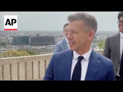 Hungary’s Péter Magyar spots Orbán on a balcony and waves at him