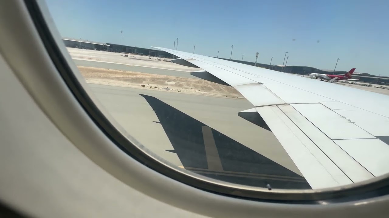 Qatar Airways Boeing B777-300ER landing and taxi at Doha/Hamad International Airport