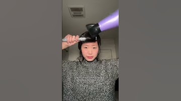 styling curtain bangs with a round brush 🎀