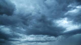 dark storm clouds are moving fast at viewer - timelapse, 4k