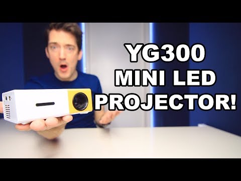 Video: Portable Projector: Features Of Portable Wireless Home Projectors. Mini Cinema Projector, LED And Other Types