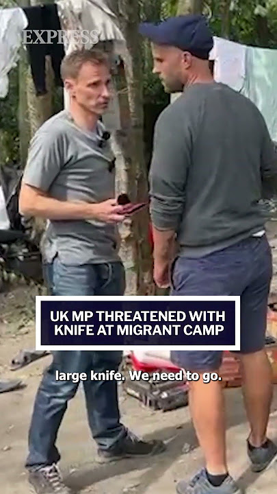 EXCLUSIVE: Shocking moment Tory MP Chris Philp is threatened inside Dunkirk migrant camp