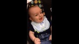 Baby laughing at being startled