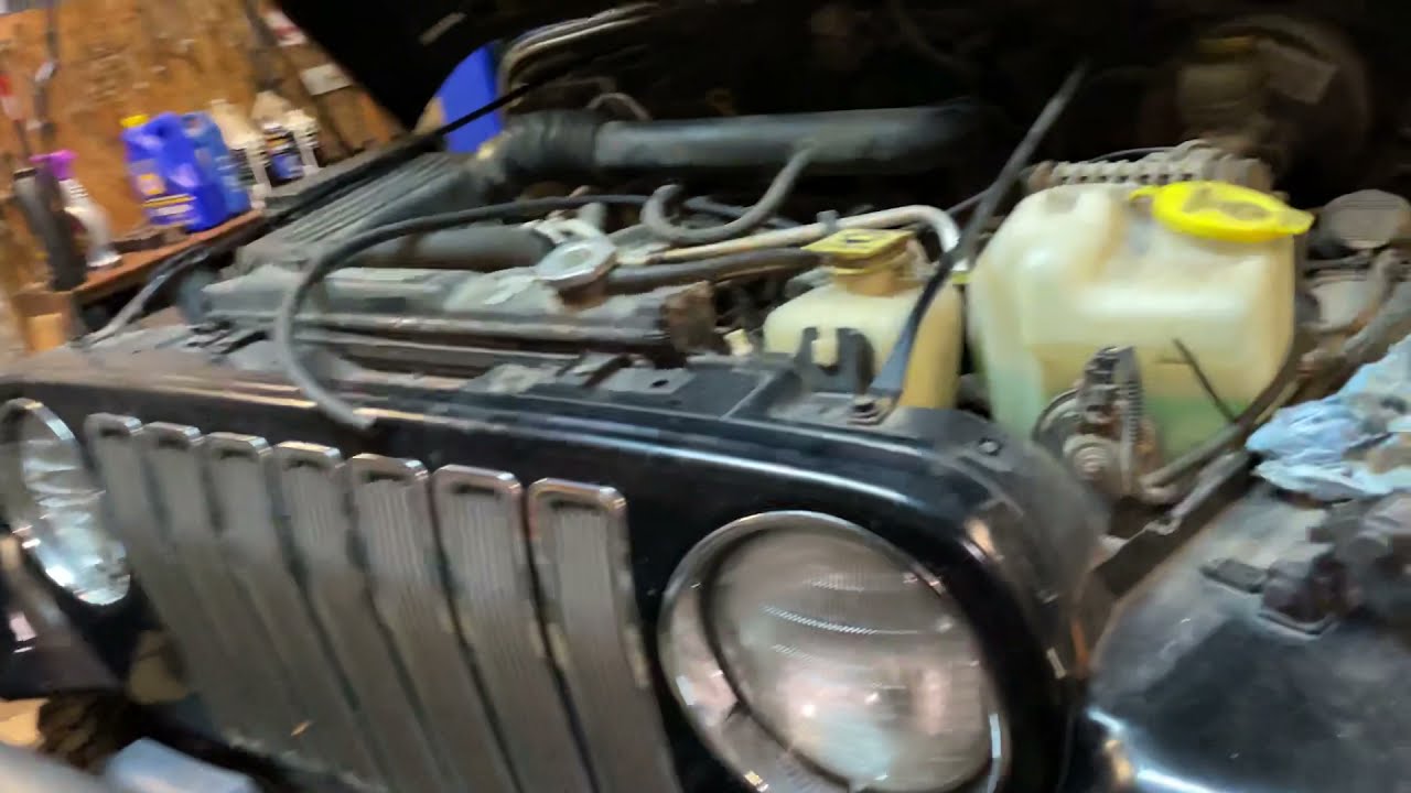 Red fluid leaking from vehicle Jeep Wrangler power steering return hose  replacement - YouTube