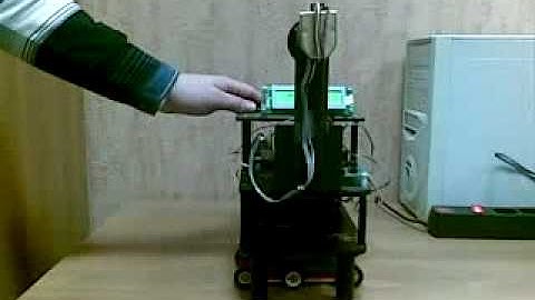 Inertia wheel pendulum on the movable support