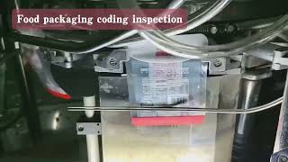 Food packaging bags with the use of visual coding machine for bag detection.