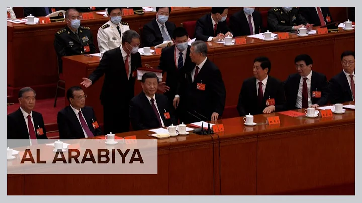 Former Chinese leader Hu unexpectedly leaves Congress closing ceremony
