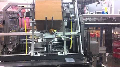 Econocorp Econocaser Tape Application with Upstacking unit