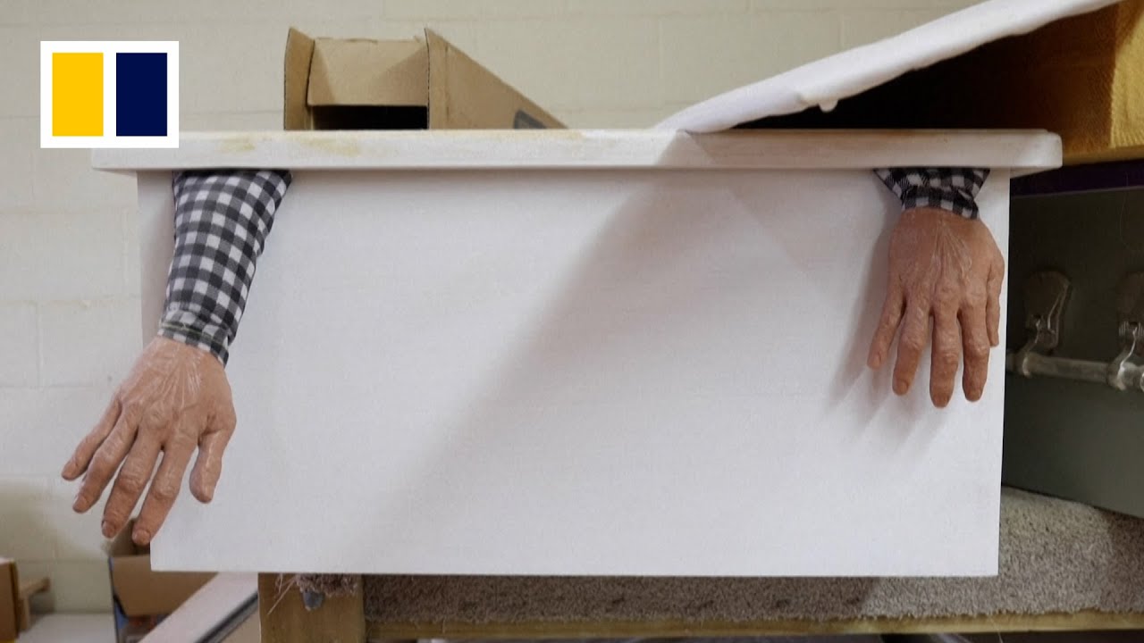 Task of grave importance: elderly in New Zealand build their own caskets