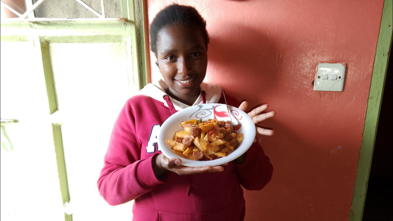 Frying  beef sausages chips and vegetables 😋