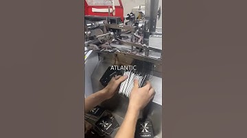 máy làm tem mác quần áo, máy lồng chỉ nhãn áo quần, máquina para fabricar etiquetas para prendas,