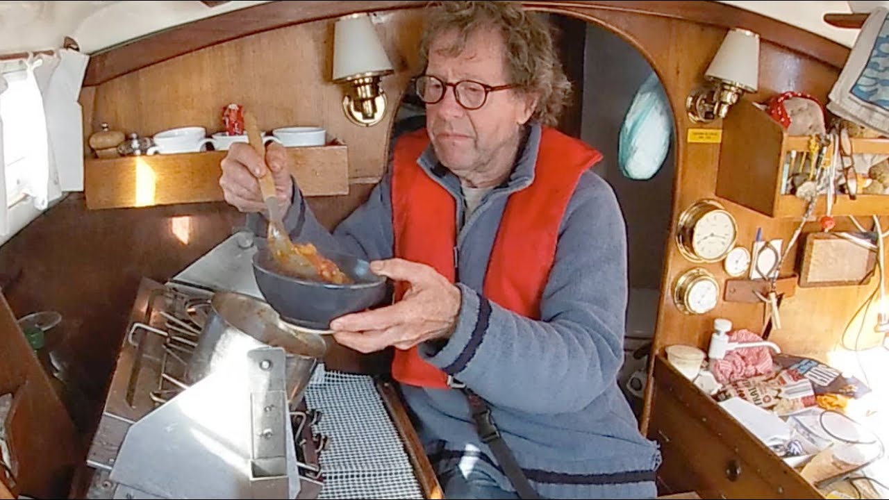 ⁣Cooking on a boat! Preparing a hot meal at sea in my 1970 Contessa 26 using one ring & fresh food