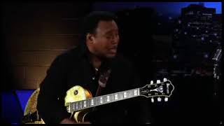 George Benson playing along the neck chords