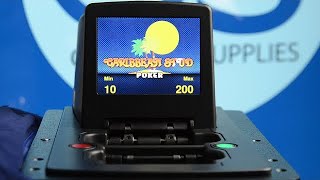 Card shuffling machine i-Deal Plus dealing playing cards for Caribbean Stud poker casino table game