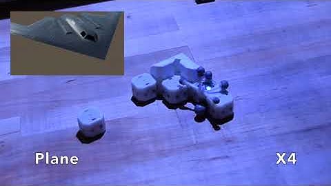 Robotic Assembly of Haptic Proxy Objects for Tangible Interaction and Virtual Reality