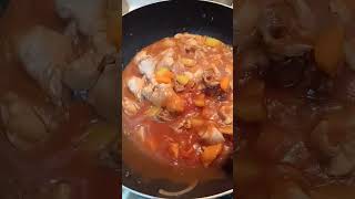 cooking chicken  with tomato  sauce