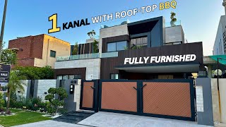 1 Kanal FULLY-FURNISHED with Roof Top Sitting Mind Blowing House For Sale DHA Lahore