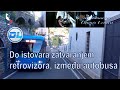 Do istovara zatvaranjem retrovizora, između autobusa i zgrada