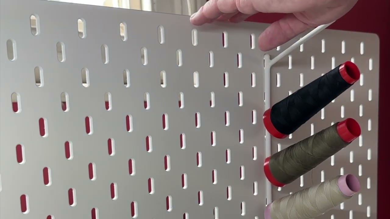 Ikea Skadis Pegboard storage hooks for overlocker/ serger thread.