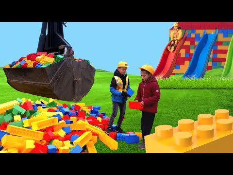 The kids build a Lego tower with a real construction vehicle 🚧👷‍♀👷‍♂