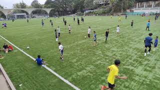 Children playing in Chandmari Football Ground in Tura, West Garo Hills, Meghalaya, India