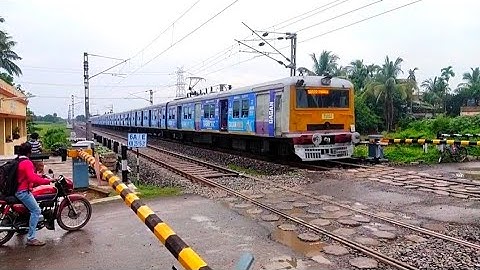 Katwa - Sealdah GaganGold Advertisement EMU local train Furious Moving Out At RailGate