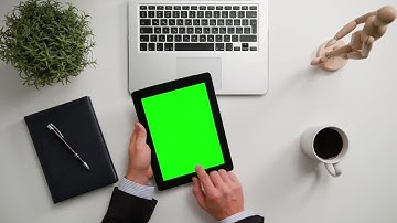 Man With iPad And Green Screen Stock Video