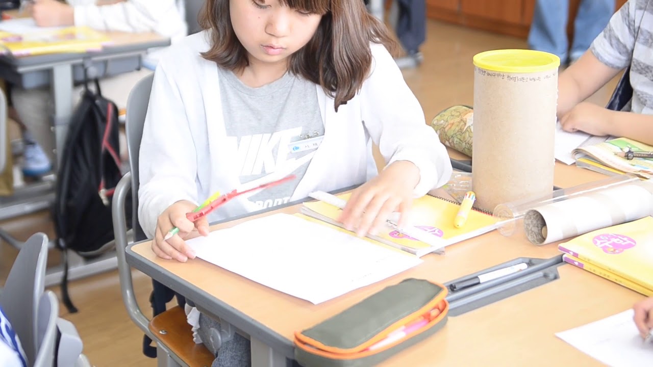 Female Student Using a Math Compass - Free Stock Creative Commons Video