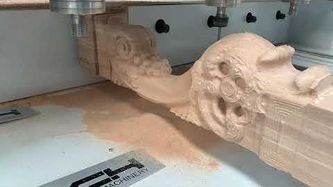 Furniture making with a CNC Router   Utilizing a 4th axis aggregate to machine a table leg