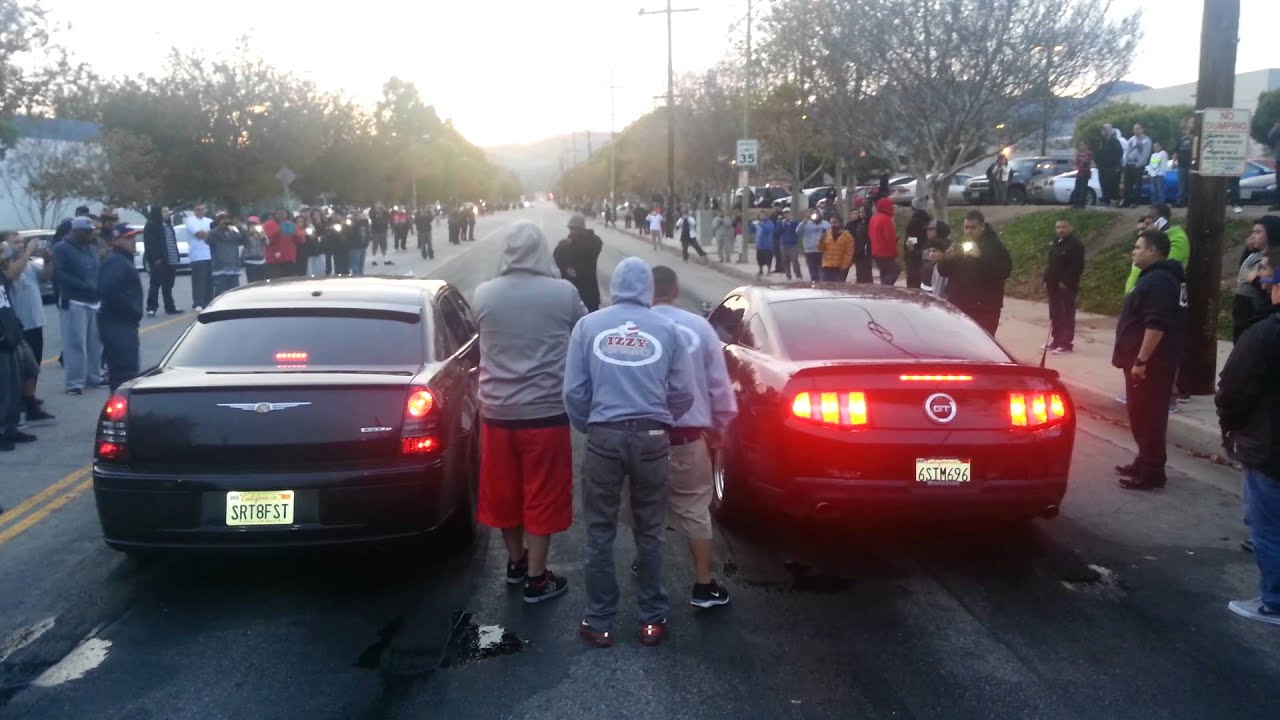 Izzy performance mustang vs. Srt8 300