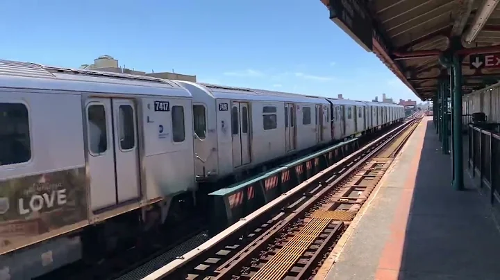 R188 (7) train hauls past 82nd st-jackson heights