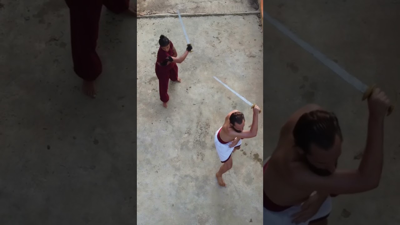 Kalaripayattu Stepping and mobility practice with swords.