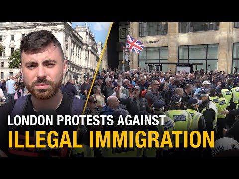 Protesters who are against illegal immigration march in the streets of London @Rebel News UK