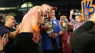 John Cena celebrates his historic 16th World Title win with a MakeAWish member