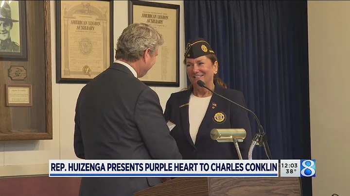 Huizenga presents Purple Heart to Charles Conklin