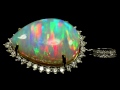 Spectacular Opal Gemstone Pendant (in white gold and diamond setting)