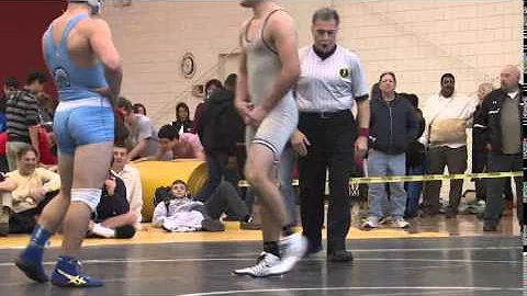 Matt Correnti of Holy Cross defeats Anthony Landbe...