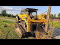 Demolishing An Old Farm Fence. Track Loader VS 100 Year Old Fence Post