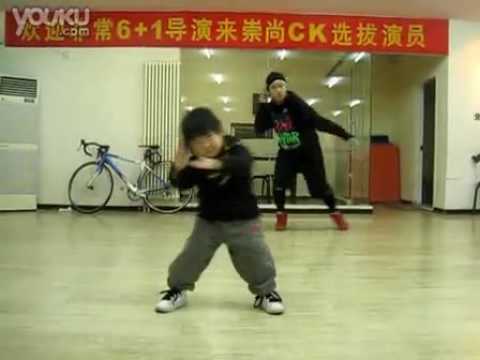 Young boy showing off his hip hop skills